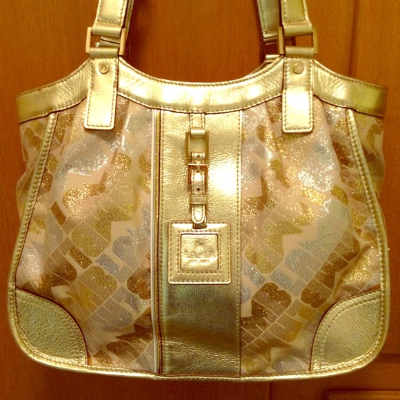 Reserved**Like new LAMB gold bag