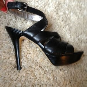 Black leather heels , new condition