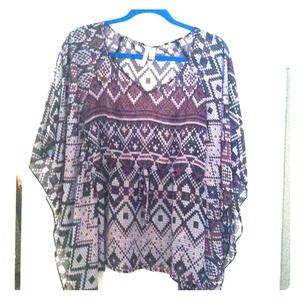 Beautiful Aztec shirt. Fitted at waste.