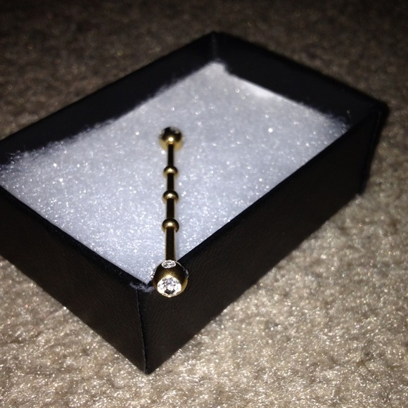 Gold industrial rod w/ gems