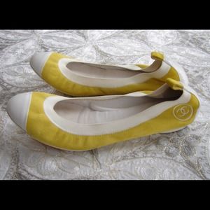 RESERVED.....Authentic Yellow Chanel Flats size 39
