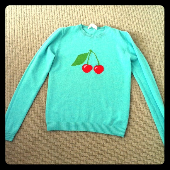 New cashmere sweater with cherry detail.