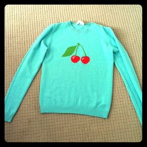 New cashmere sweater with cherry detail.