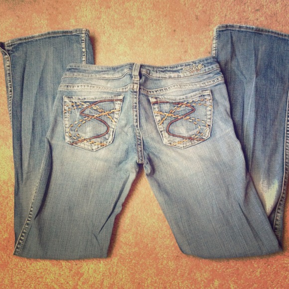 Silver jeans.