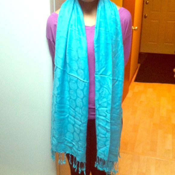 New without tag. Soft teal color scarf.