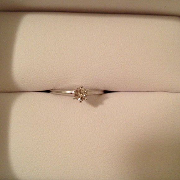 1/5th carat diamond in white gold band