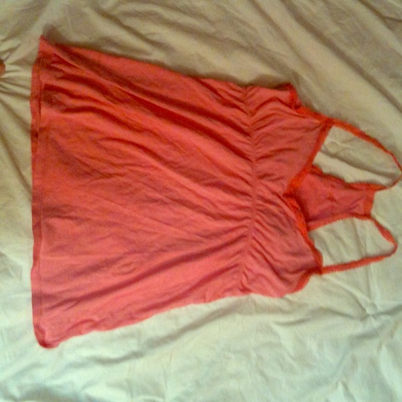 Pre owned peachy pink  race back top.