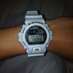White G Shock watch.