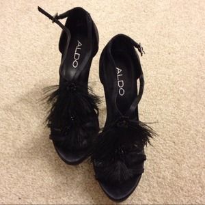 black pumps with feathers