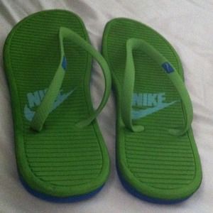 Green/blue Nike flipflops