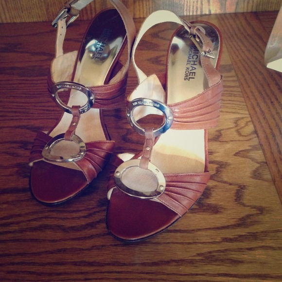 NWOT brown Michael Kors heels.