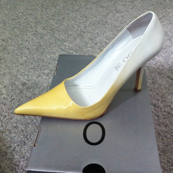 **SOLD**.  Yellow and white heel