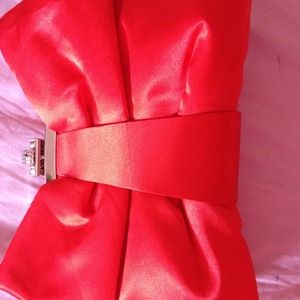 Elegant satin red clutch with beautiful clasp