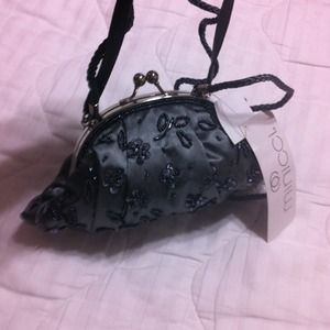 clutch; jewel embellish. detach shoulder strap. clutch; jewel embellish. detach shoulder strap.