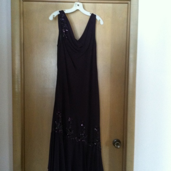 Wore 1 time. Beautiful dark purple sequined dress.
