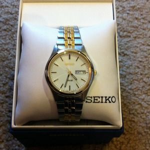 Silver and gold Seiko watch. New in box