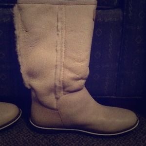 Cream colored leather boots, worn once.
