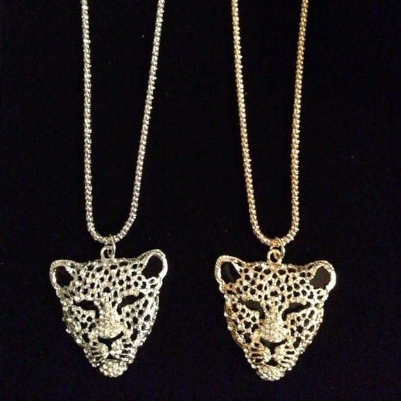 Gold and silver leopard necklace w/matching studs.