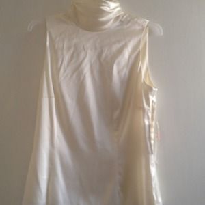 Cream color silk sleeveless blouse, size 6