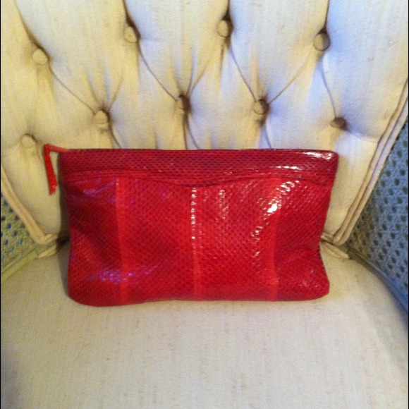 Red snakeskin clutch.