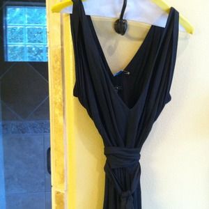 Black sleeveless dress with tie belt