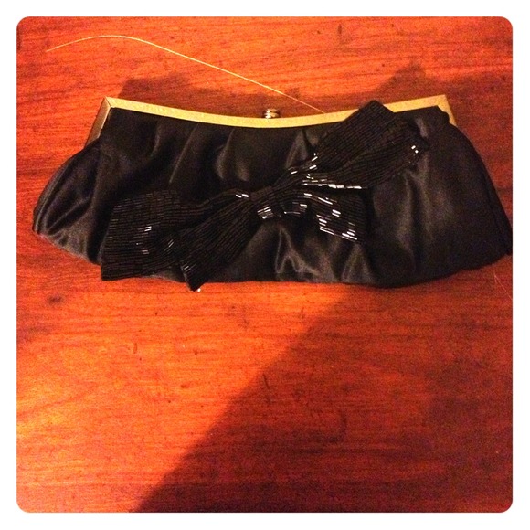 Black sequin bow clutch