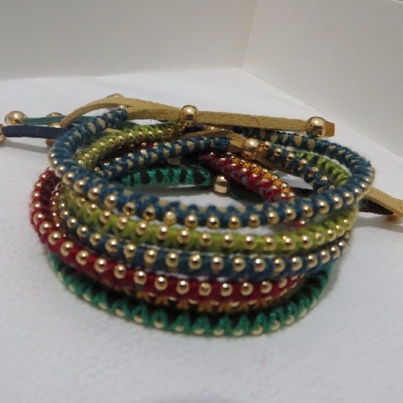 Little gold chain bracelets.