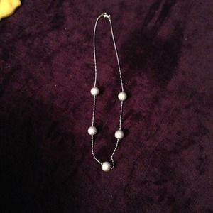 Silver toned necklace with glitter balls