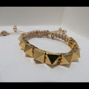 Spike bracelet.