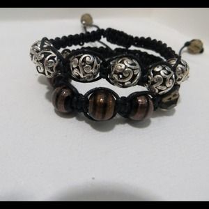1 silver and 1 colorful bracelet