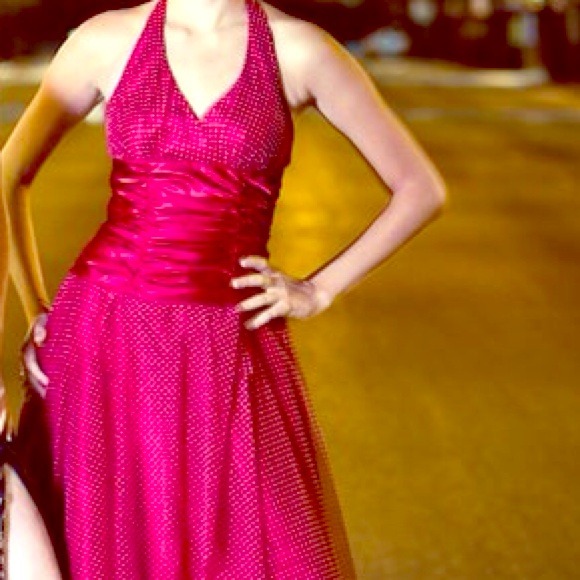 Red polka dot floor length dress.