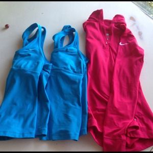 Nike tanks and long sleeve - $20 each.