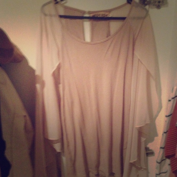 Neutral dress size M ( Tight fit /fits small )