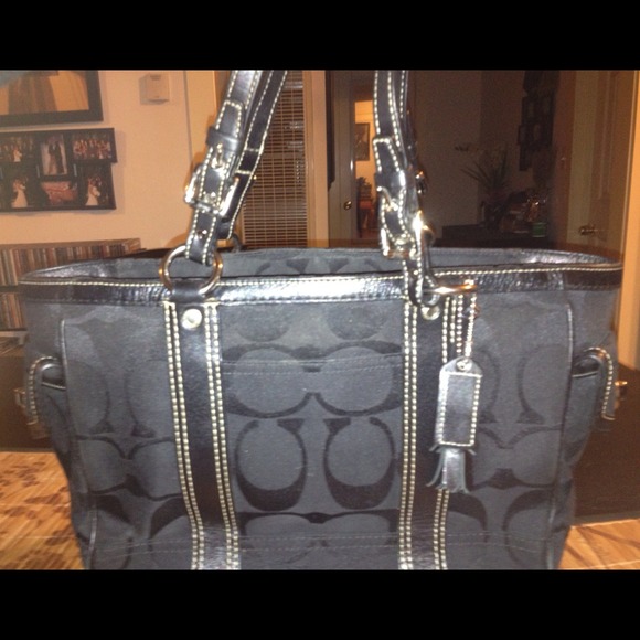 Authentic **Coach**  signature