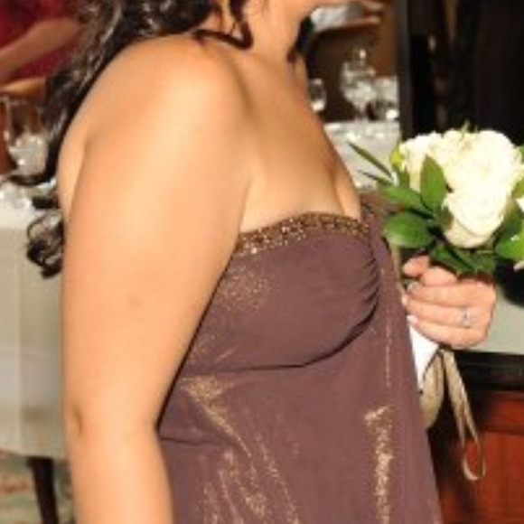 Brown floor length evening gown with gold accents