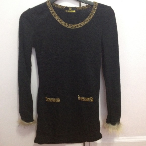 Tunic with furry sleeves