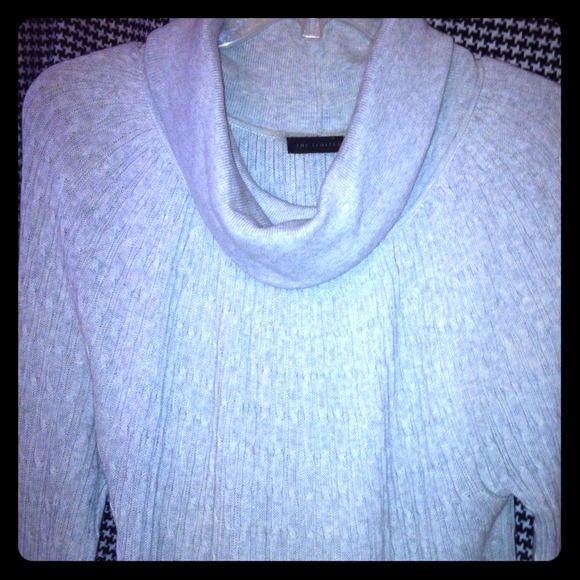 Limited gray cow neck sweater.