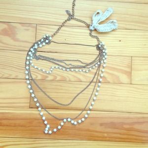 Long pearl and metal necklace