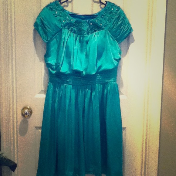 Size 14 dress with green embellishing