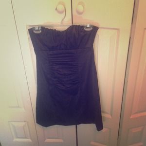 Black silk cocktail dress with cut out back