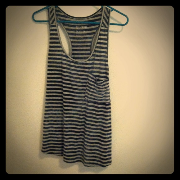 Long oversized tank with pocket