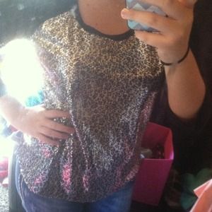 Sequin 3 quarter length shirt.