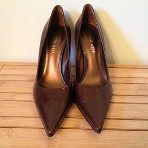 Nine West dark brown pumps.  Size 6.