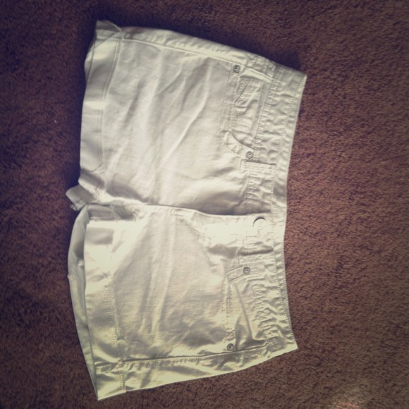 Pair of white shorts.