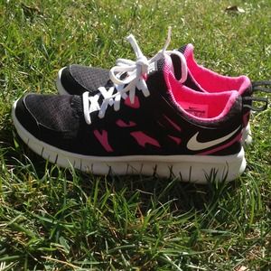 Pink and black Nike free run 2