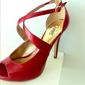 Strappy red stilettos Carlos Santana price reduced