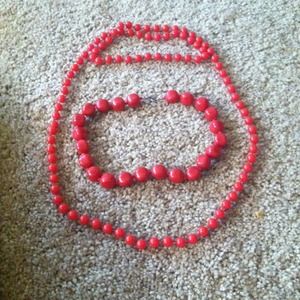2 sets of red beads