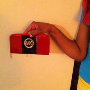 Red and Black Michael Kors wallet...patten Leather