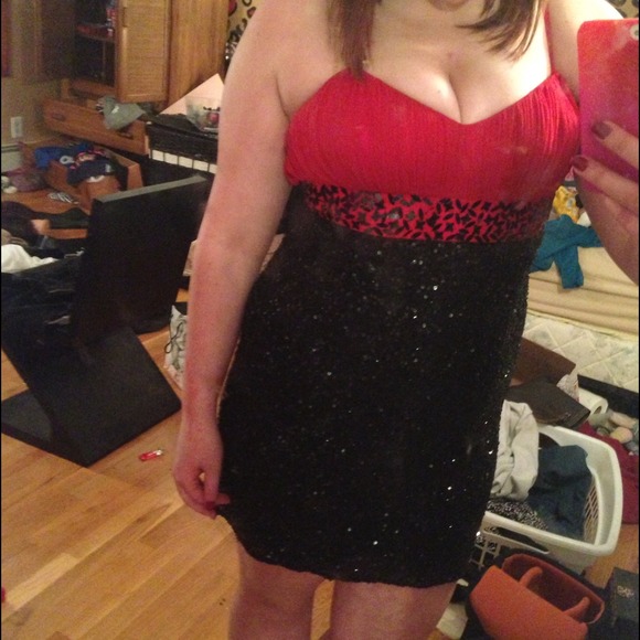 Black and red sequins dress.