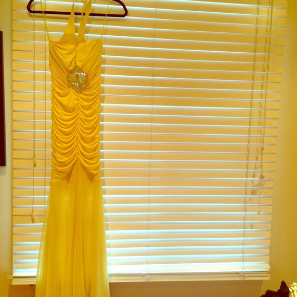 Formal form fitting yellow gown
